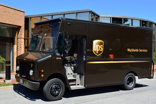 Delivery vehicles parked at a shipping facility
